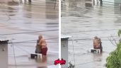 Foto ilustrativa de la nota titulada: VIDEO: Abuelitos se abrazan en medio de inundación y se hacen virales